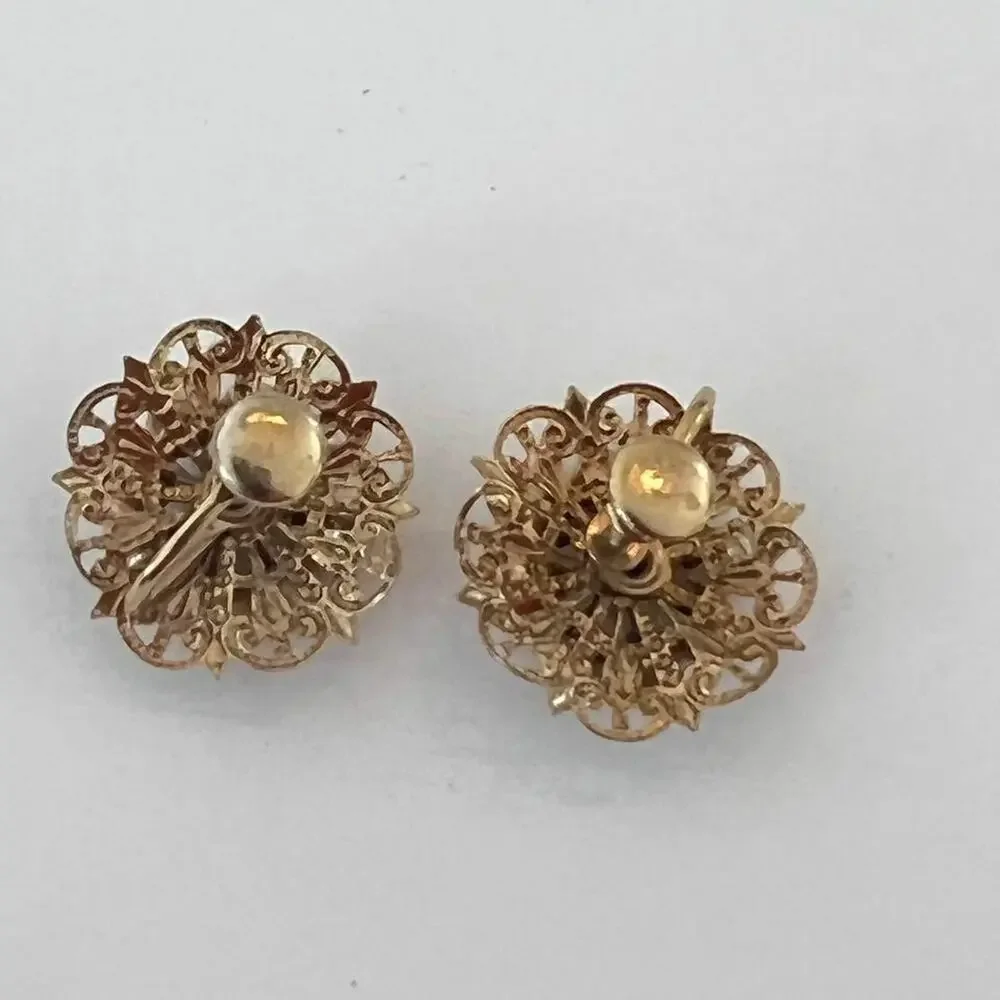 Vintage 60s Gold Filligree And Purple Rhinestone Clip On Earrings